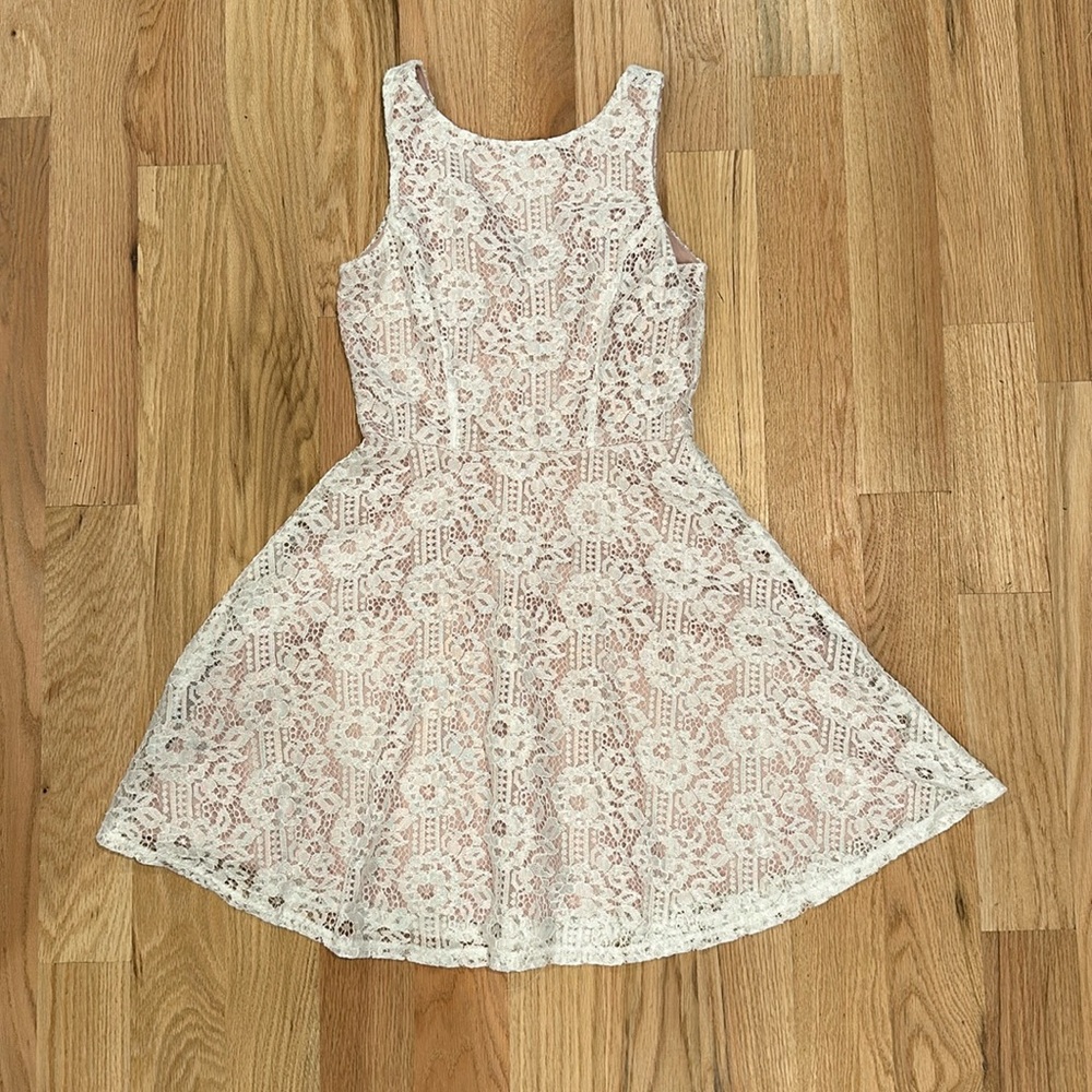 Blush dress with white lace overlay